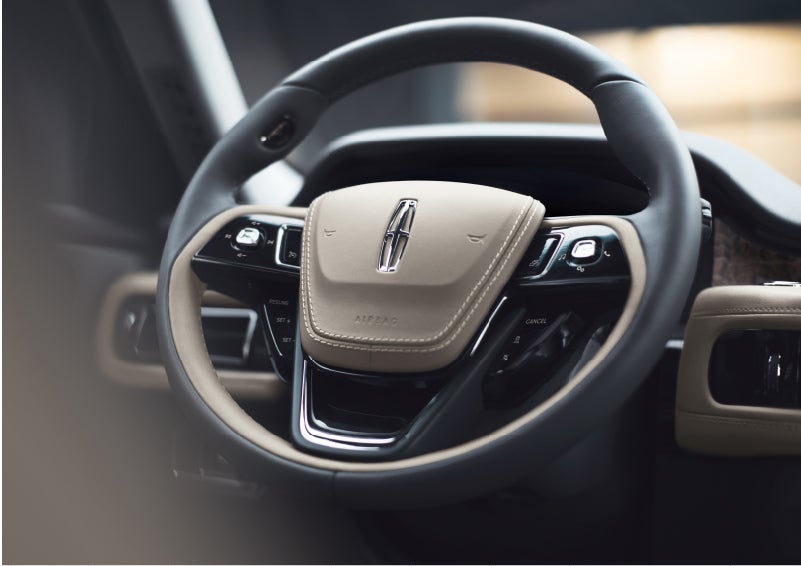 The intuitively placed controls of the steering wheel on a 2023 Lincoln Aviator® SUV | Beck Lincoln in Palatka FL