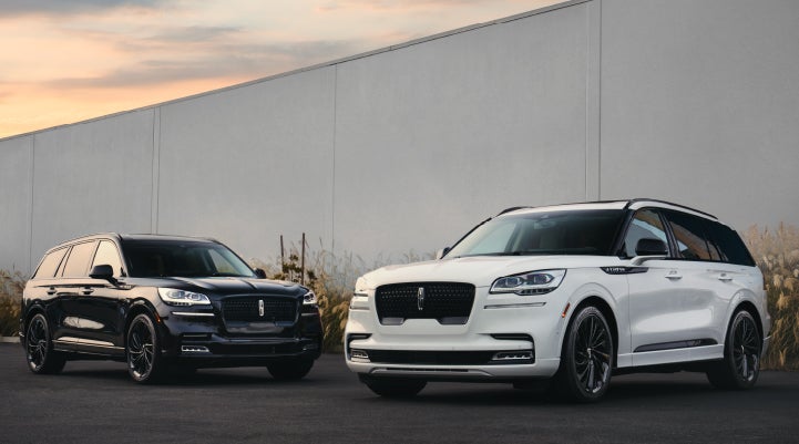 Two Lincoln Aviator® SUVs are shown with the available Jet Appearance Package | Beck Lincoln in Palatka FL