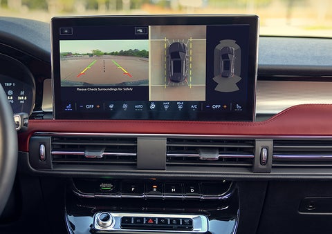 The driver of a 2024 Lincoln Corsair® SUV is shown selecting the drive mode. | Beck Lincoln in Palatka FL
