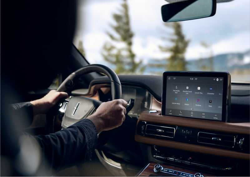 The Lincoln+Alexa app screen is displayed in the center screen of a 2023 Lincoln Aviator® Grand Touring SUV | Beck Lincoln in Palatka FL